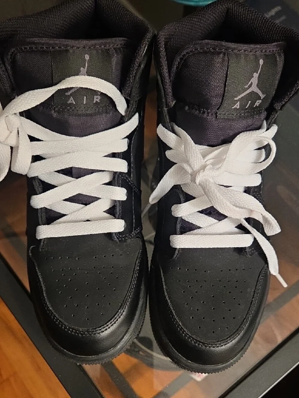 Jordan Kids Black and White High-Top Sneakers
